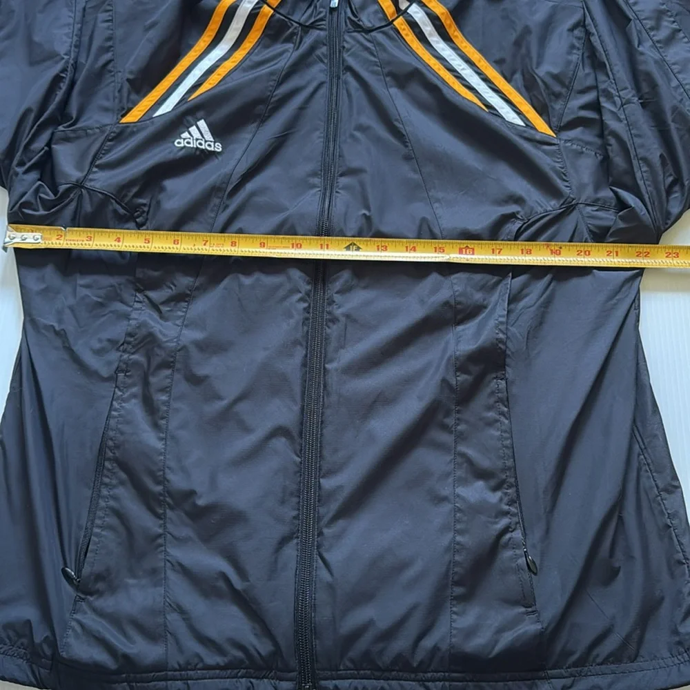Vintage Adidas black, orange & white windbreaker jacket.  Men’s size small